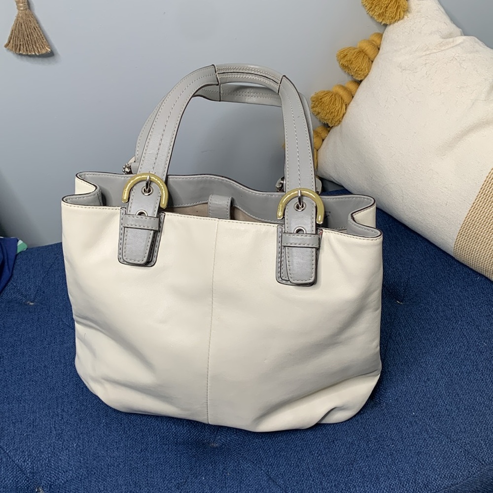 Coach bag. White and grey with silver and olive resin buckle.